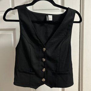 Black fitted vest
